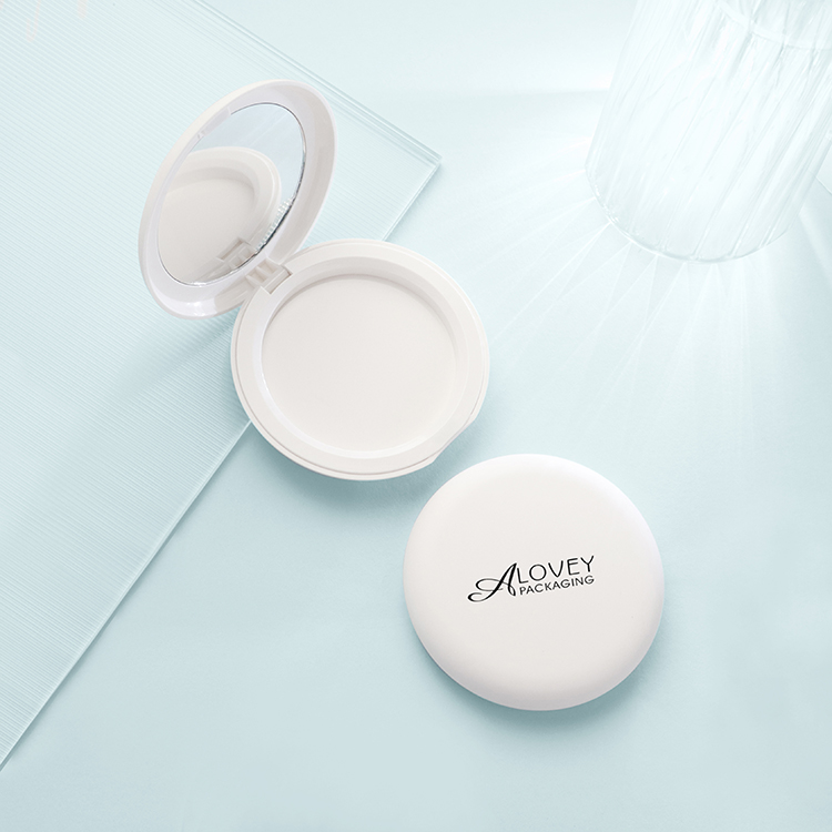 empty powder compact case with mirror